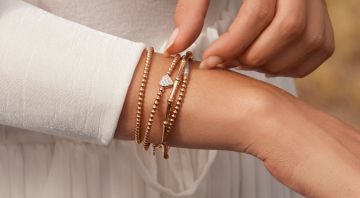Al Coro Armschmuck Banner Desktop
