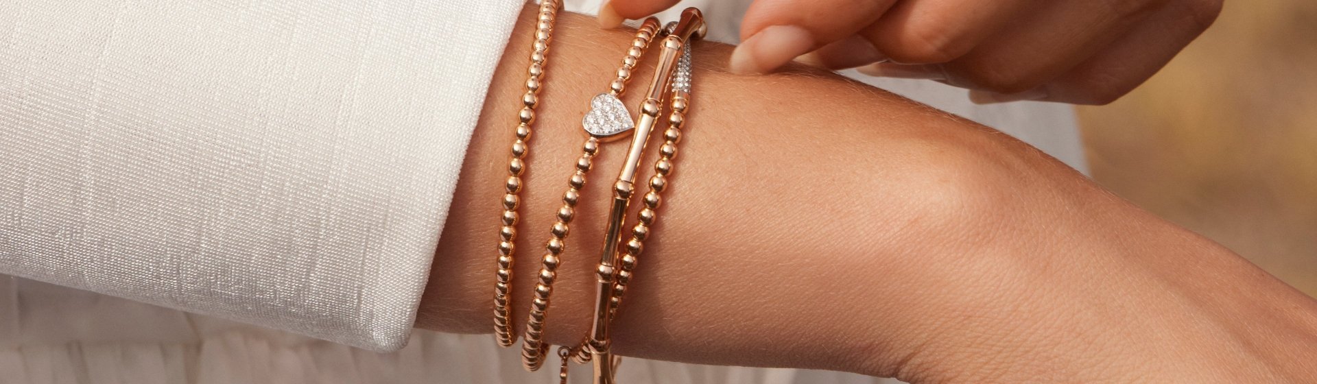 al-coro-armschmuck-banner-desktop